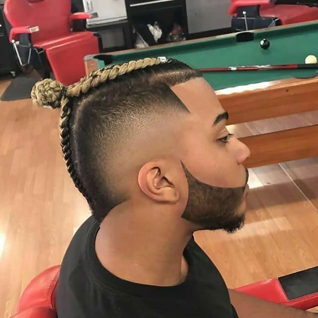 black guy with blonde braided hairdo