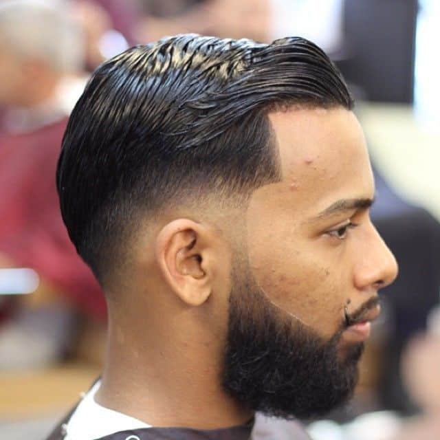 black guy with straight comb over