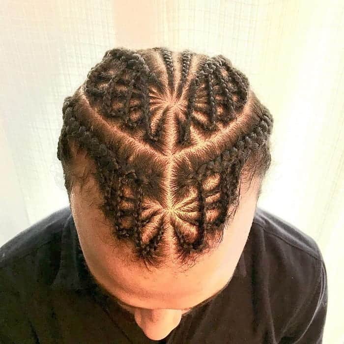 guy with short hair braids