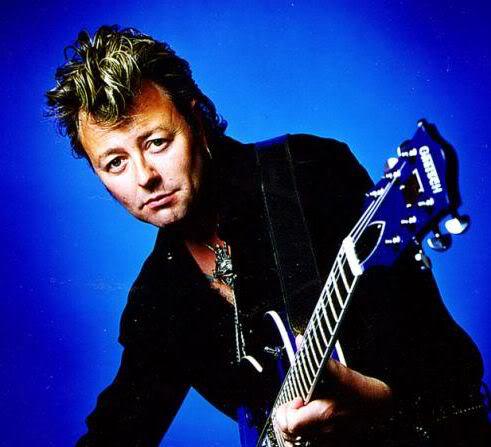 Picture of Brian Setzer classic rockabilly hair.