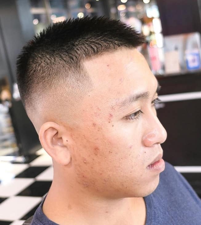 Asian guy with butch cut