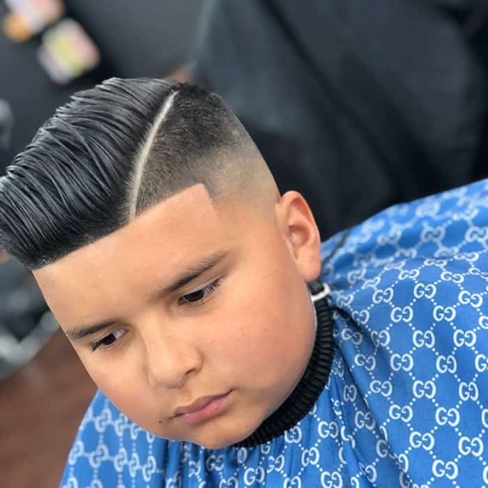 little boy with comb over haircut