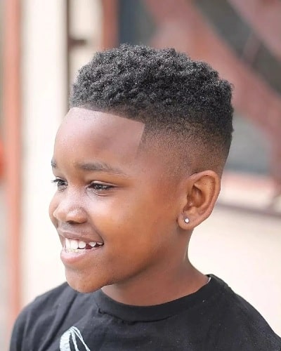 fade with short curl hairstyles for little guy