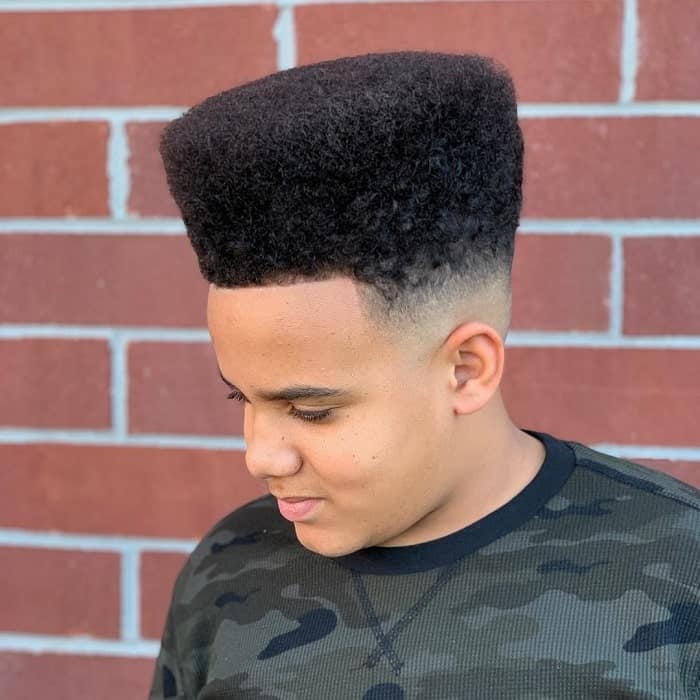 Voluminous Curly High Top Fade