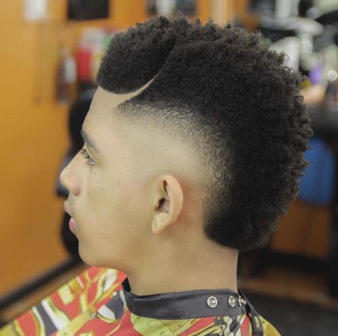 curly mohawk with high fade
