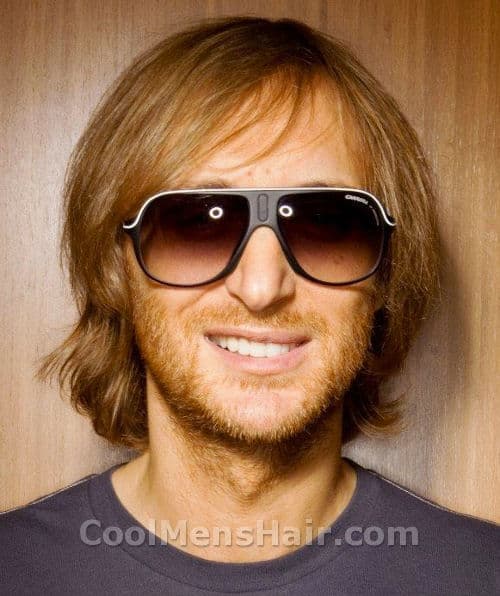 Photo of David Guetta hairstyle.