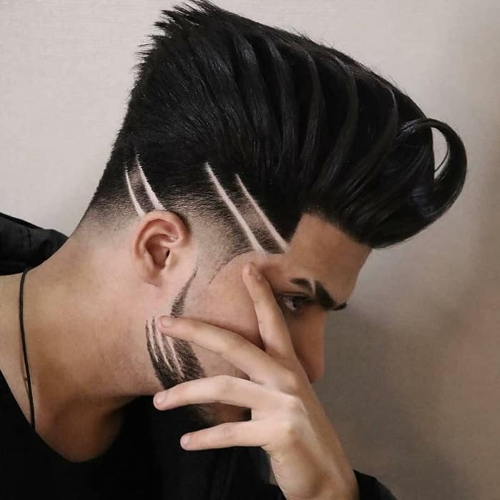 mid fade undercut with surgical lines