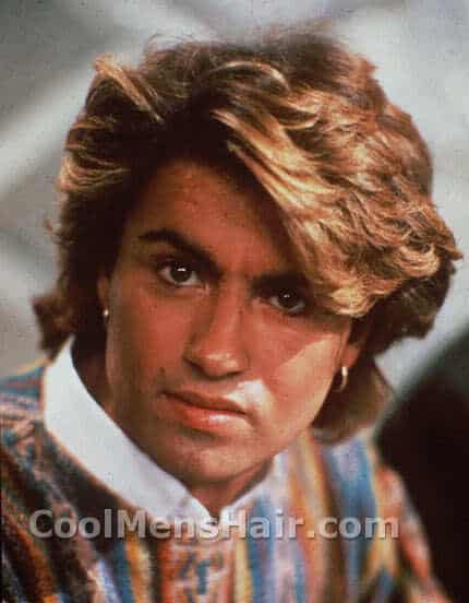 Image of George Michael medium length hair style.