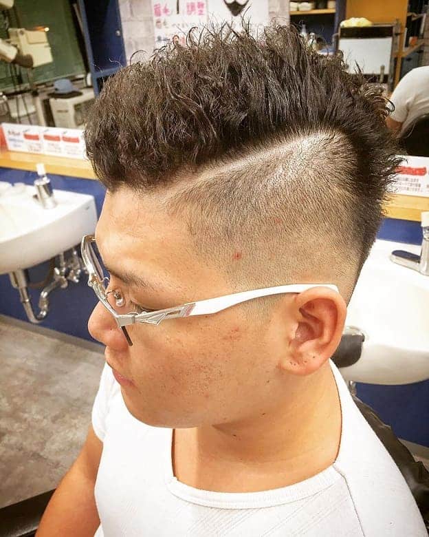 textured hard part haircut