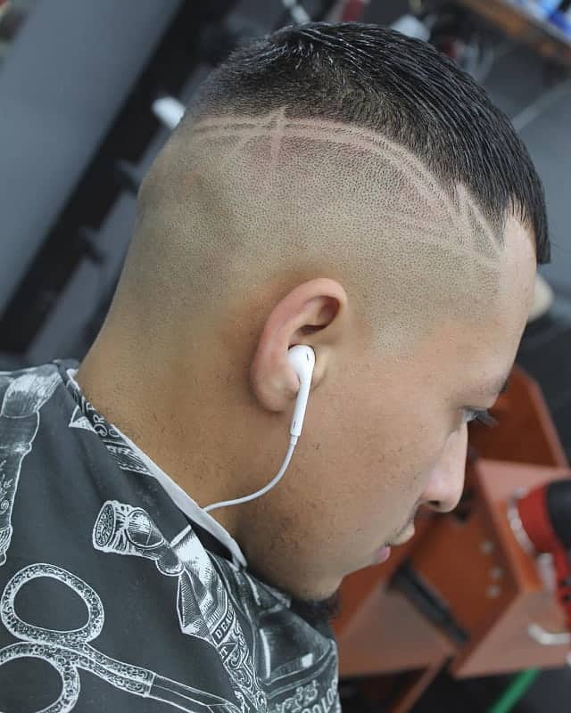 high bald fade with sleek short hair