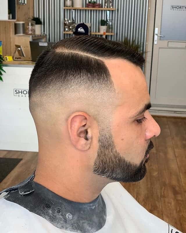 high skin fade with hard part