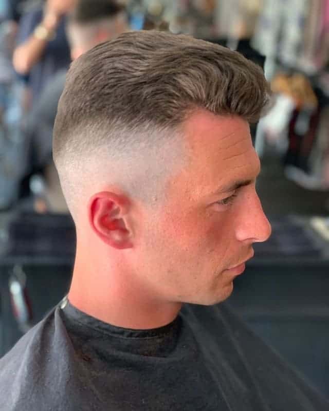 high skin fade with wavy hair