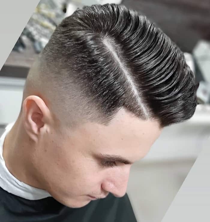 high taper fade with side part