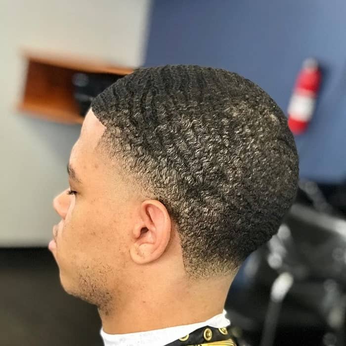 afro hair with high taper fade 