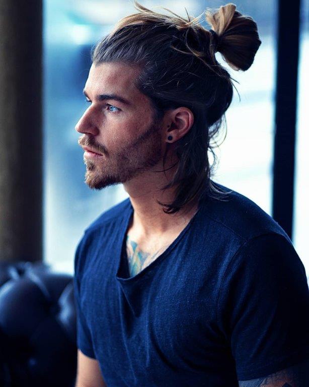 hipster guy with half up man bun