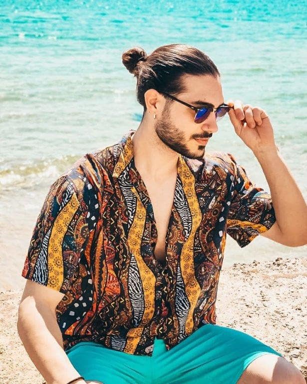 slick back man bun for hipster guys