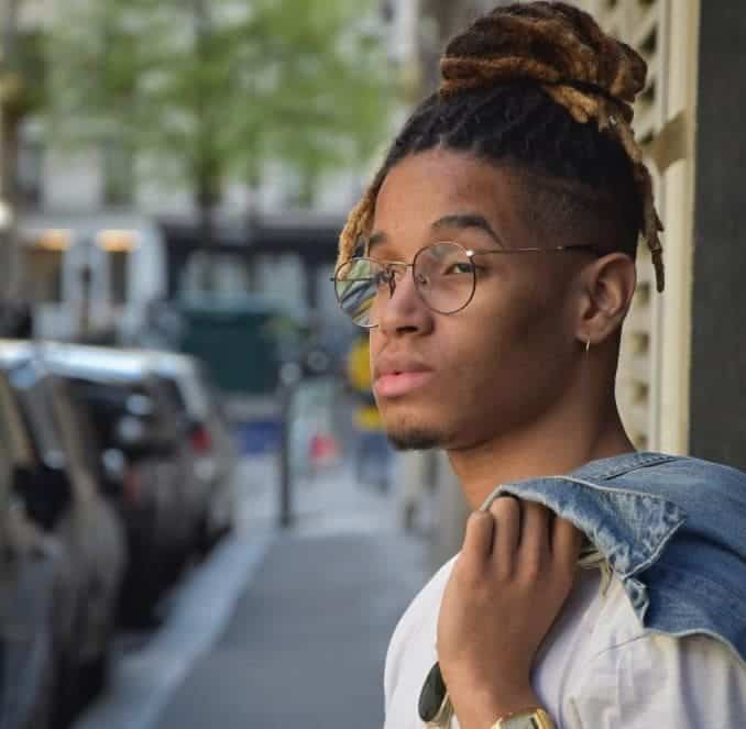 rastas entrelazadas con top knot