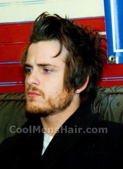 Image of Jared Followill messy hairstyle for men. 