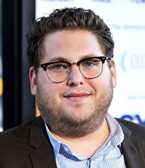 Photo of Jonah Hill wavy hairstyle.