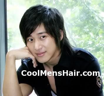 Image of Lee Wan side swept hairstyle. 