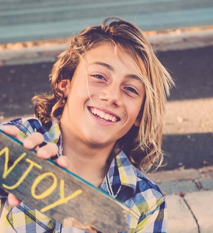 long blonde hairstyle for teenager boys