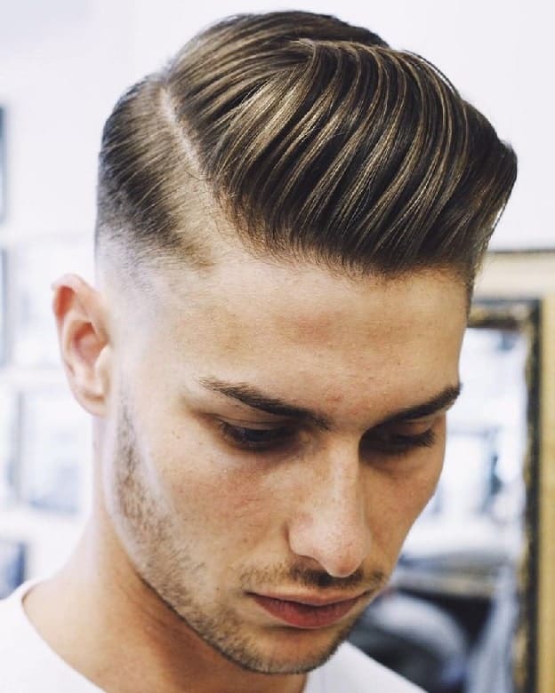 comb over quiff with low skin fade