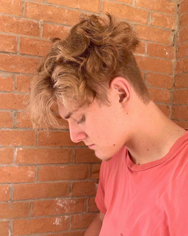 medium curly hairstyles for boys