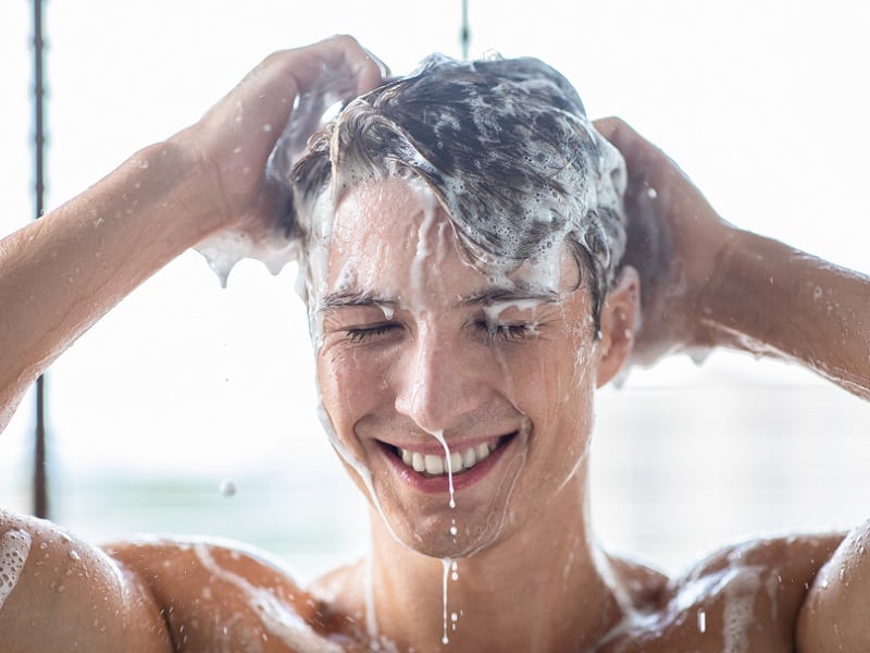 men washing straight hair