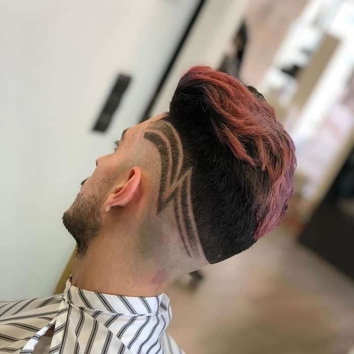 mid bald fade with messy pink hair