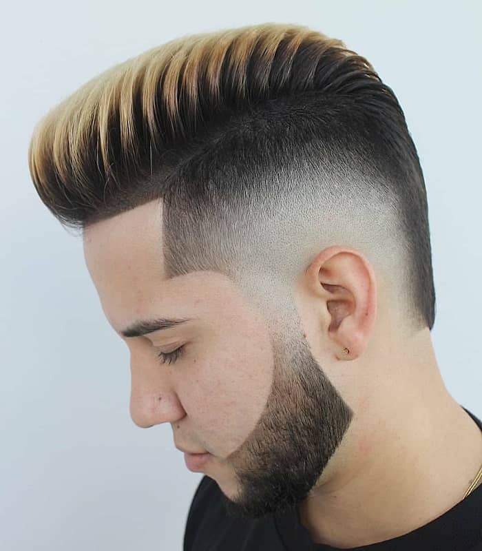 mid bald fade hairstyle with highlights