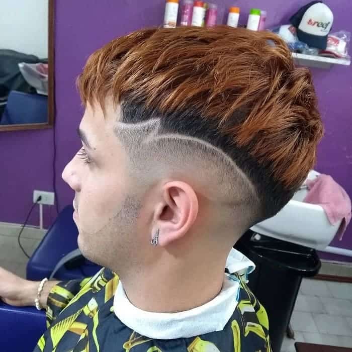  mid bald fade with short red hair 