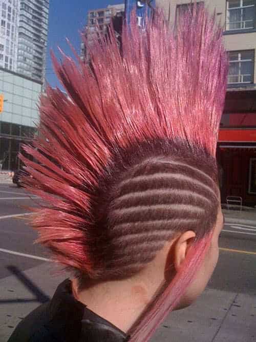 Mohawk hair with straight tattoo.