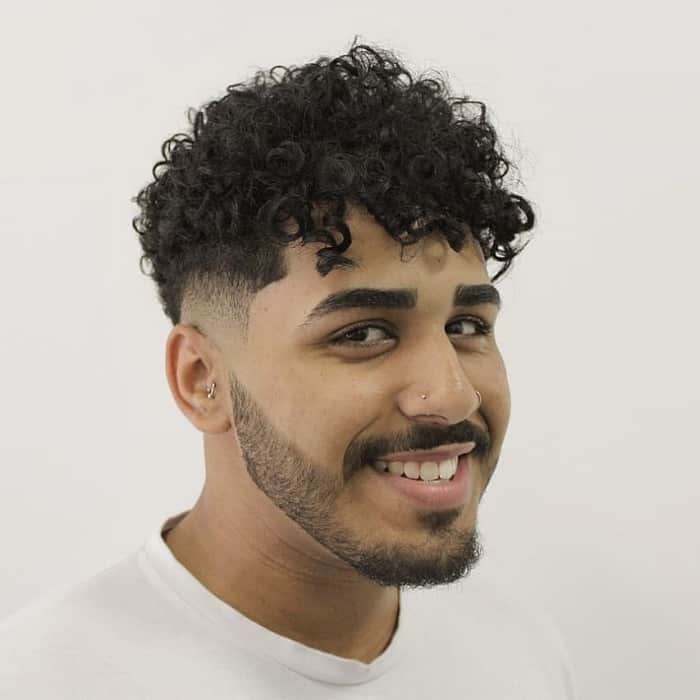 Image of Curly taper fade oblong face shape curly hairstyles male