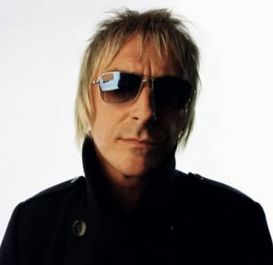 Photo of Paul Weller hairstyle.