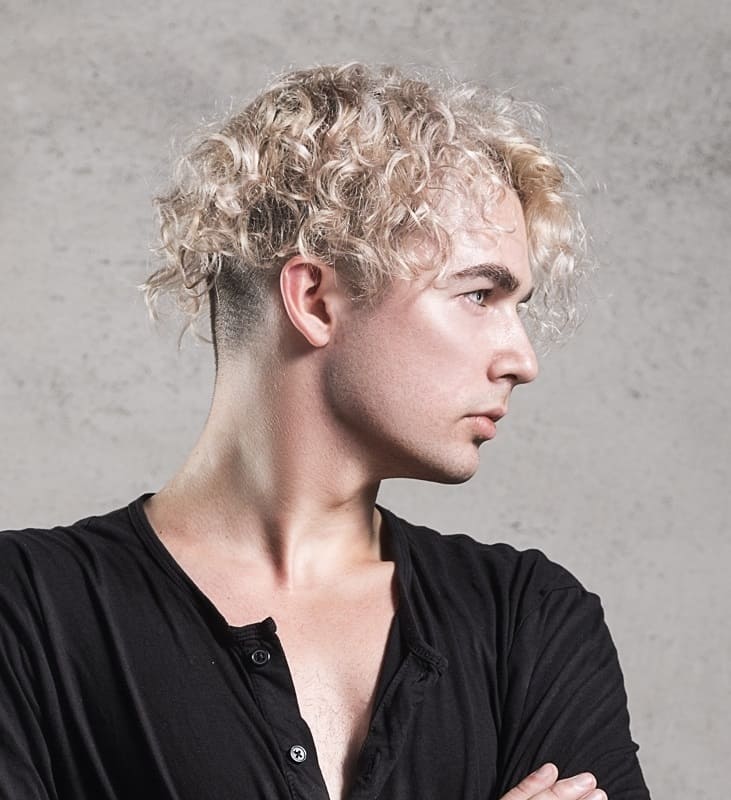 blonde guy with permed hair