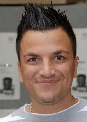 Peter Andre spiky hair with white streaks.
