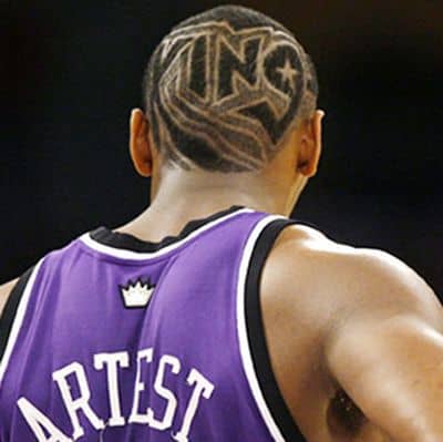 Photo of Ron Artest hair with King lettering.