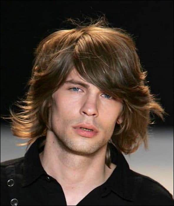 Image of Shaggy mop hairstyle with a side part