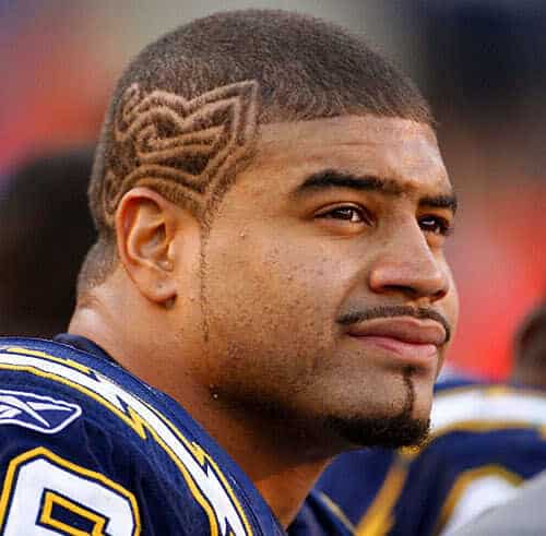 Image of Shawne Merriman hair tattoo.