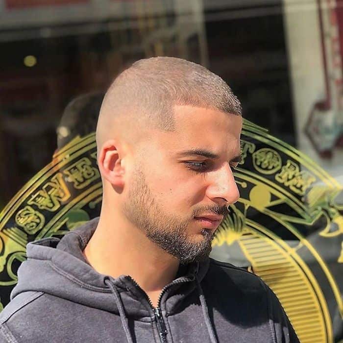 short buzz cut with bald fade