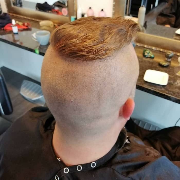 short faux hawk with shaved head 