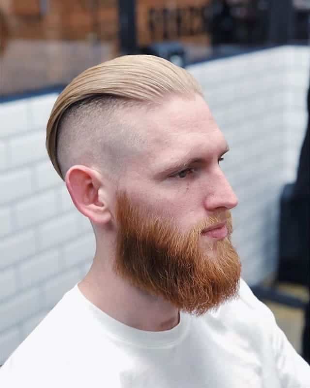 slick back bald fade with disconnected undercut