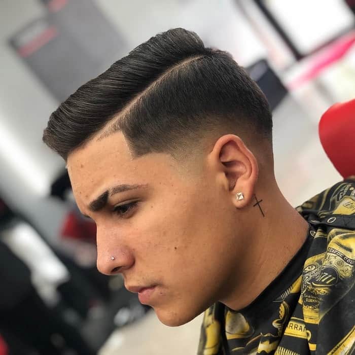 taper fade blowout hair with hard part 