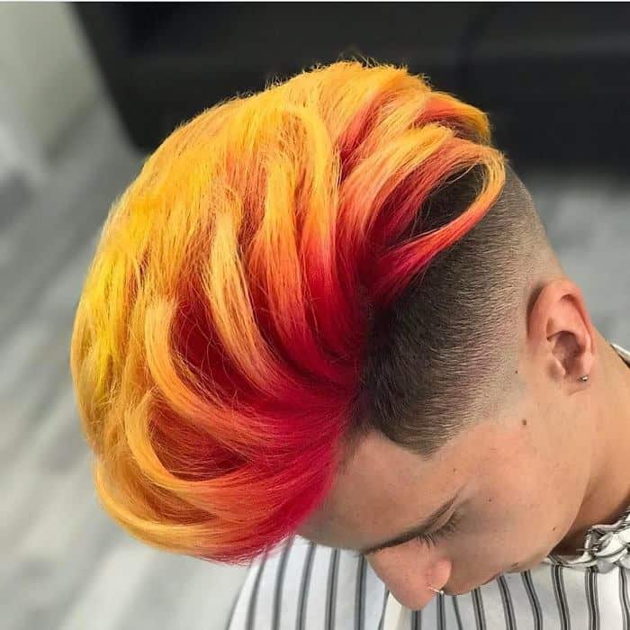 tapered low fade with fiery long hair