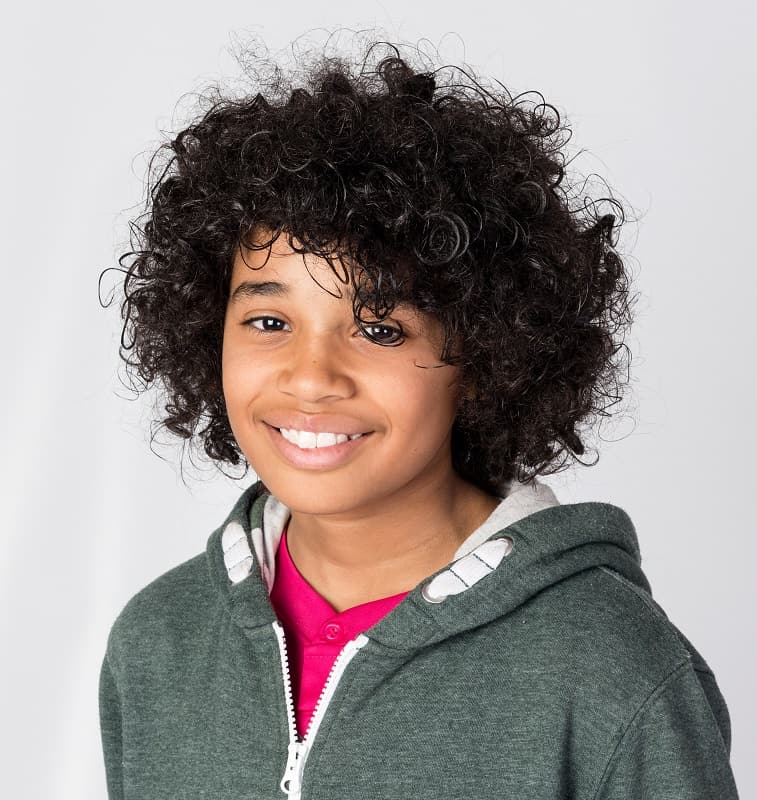 teen boy with long Afro hair