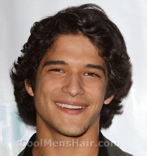 Photo of Tyler Posey with wavy hairstyle.
