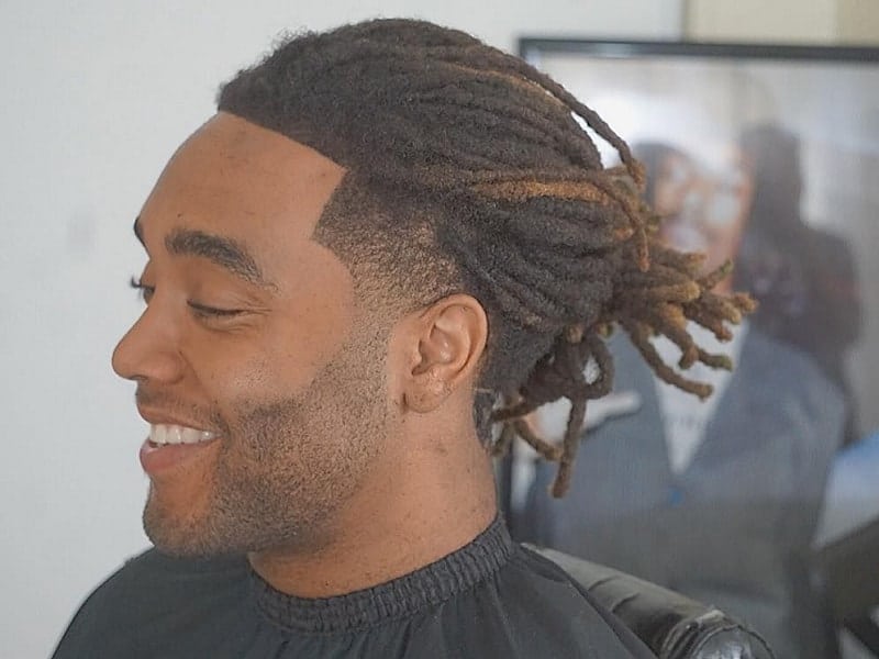 dreadlocks with undercut and stubble beard