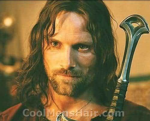 Picture of Viggo Mortensen as Aragorn with long hairstyle.