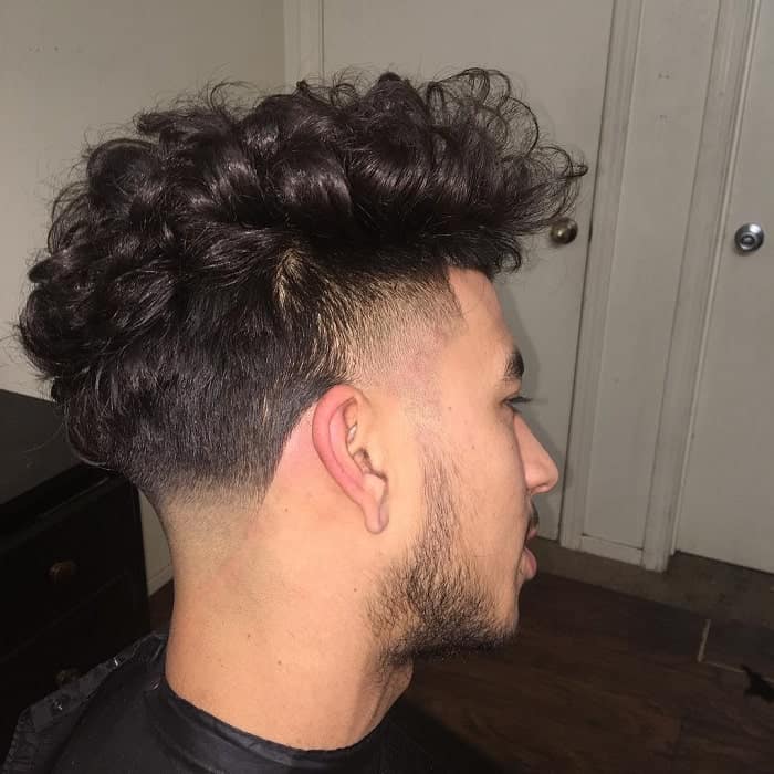 wavy hair with taper fade