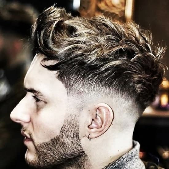 medium fade haircuts for men with wavy hair